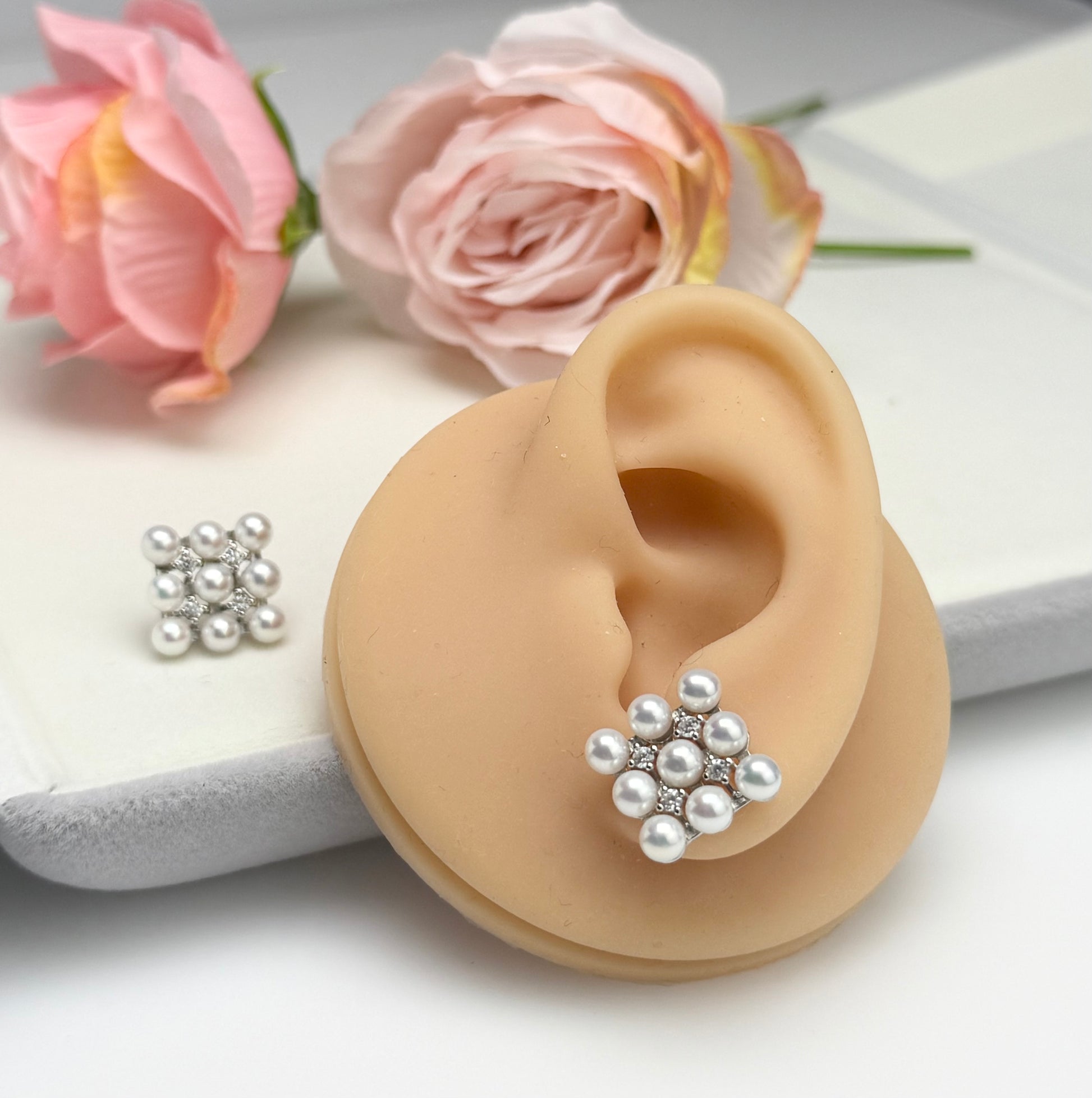 Elegant Blossom Freshwater Pearl (4-4.5mm) Stud Earrings.