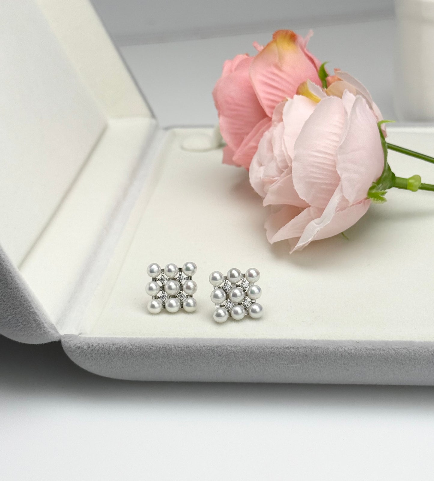 Elegant Blossom Freshwater Pearl (4-4.5mm) Stud Earrings.