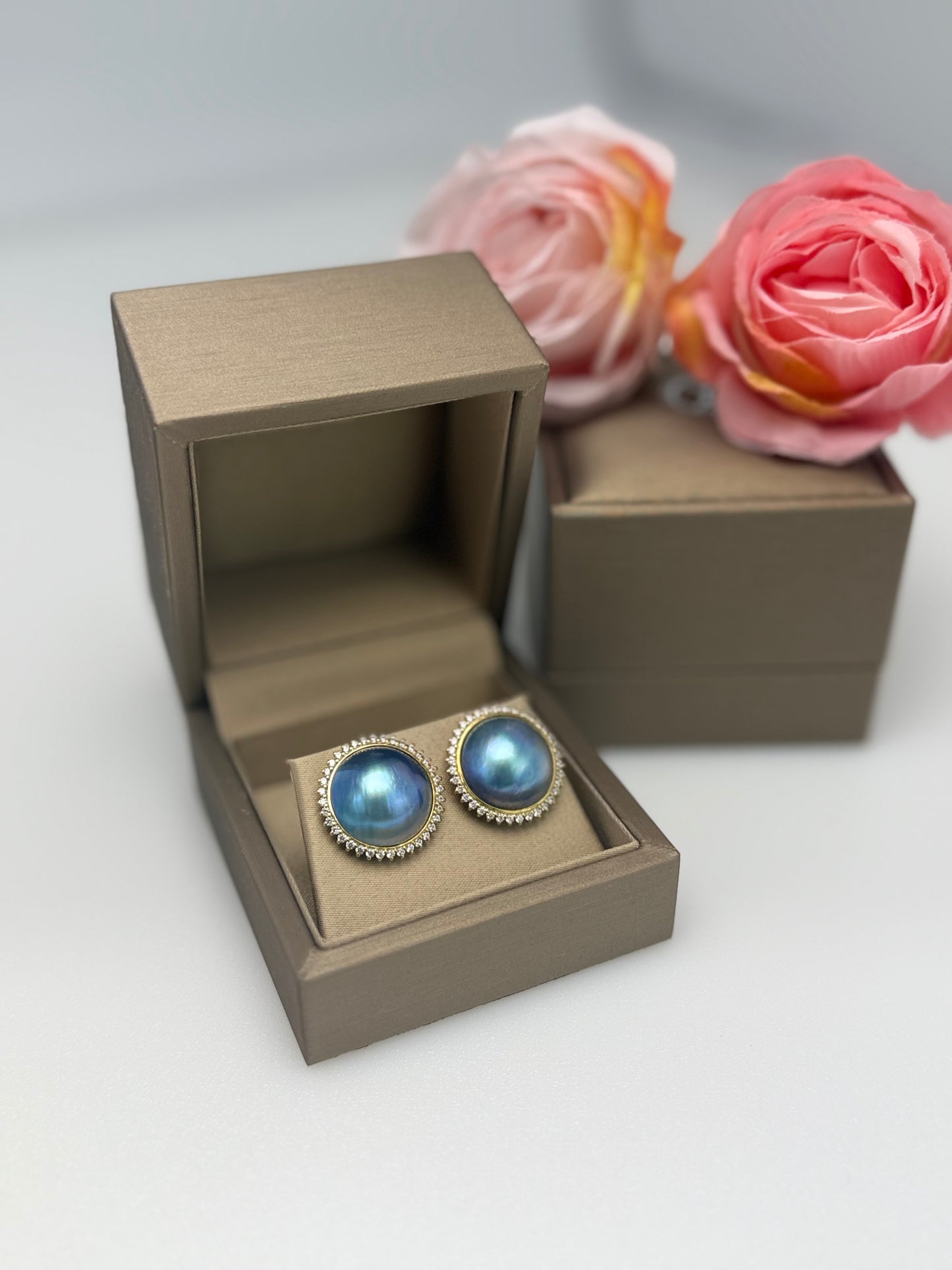 Elegant Saltwater Mabe Pearl (15mm) Earrings with CZ.