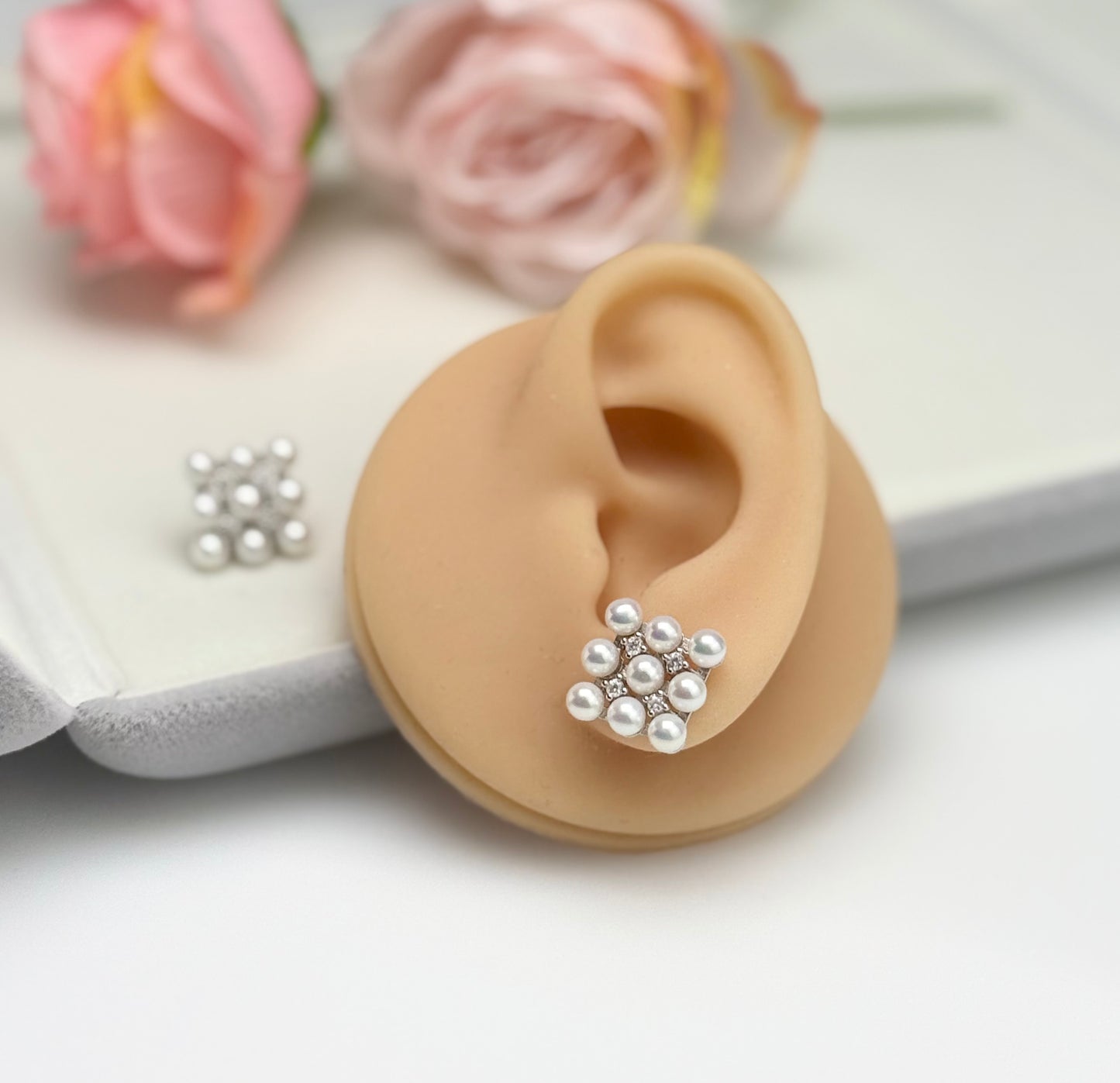 Elegant Blossom Freshwater Pearl (4-4.5mm) Stud Earrings.