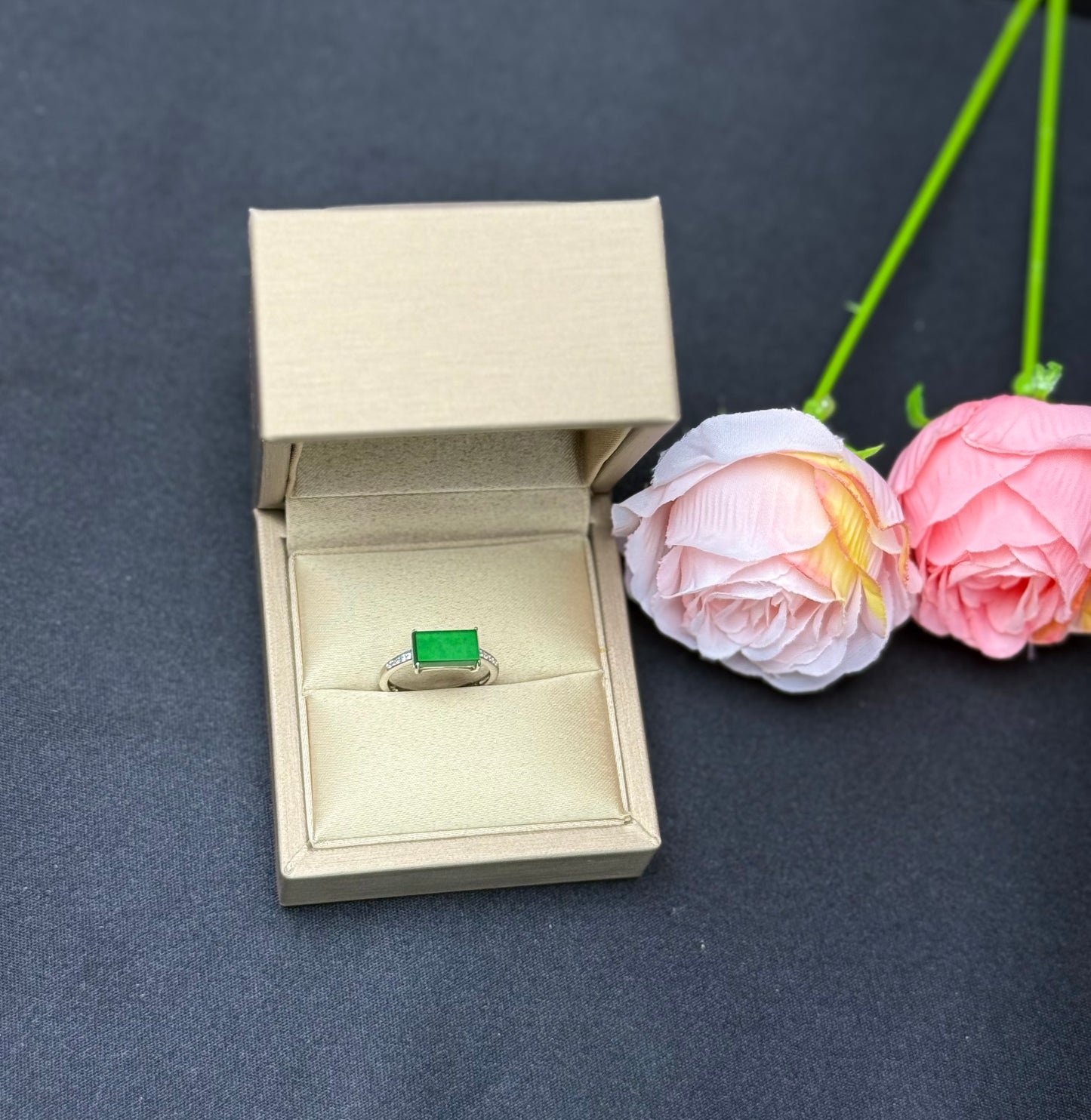 Natural Grade A Radiant Green Jadeite Ring with Diamond Accents.