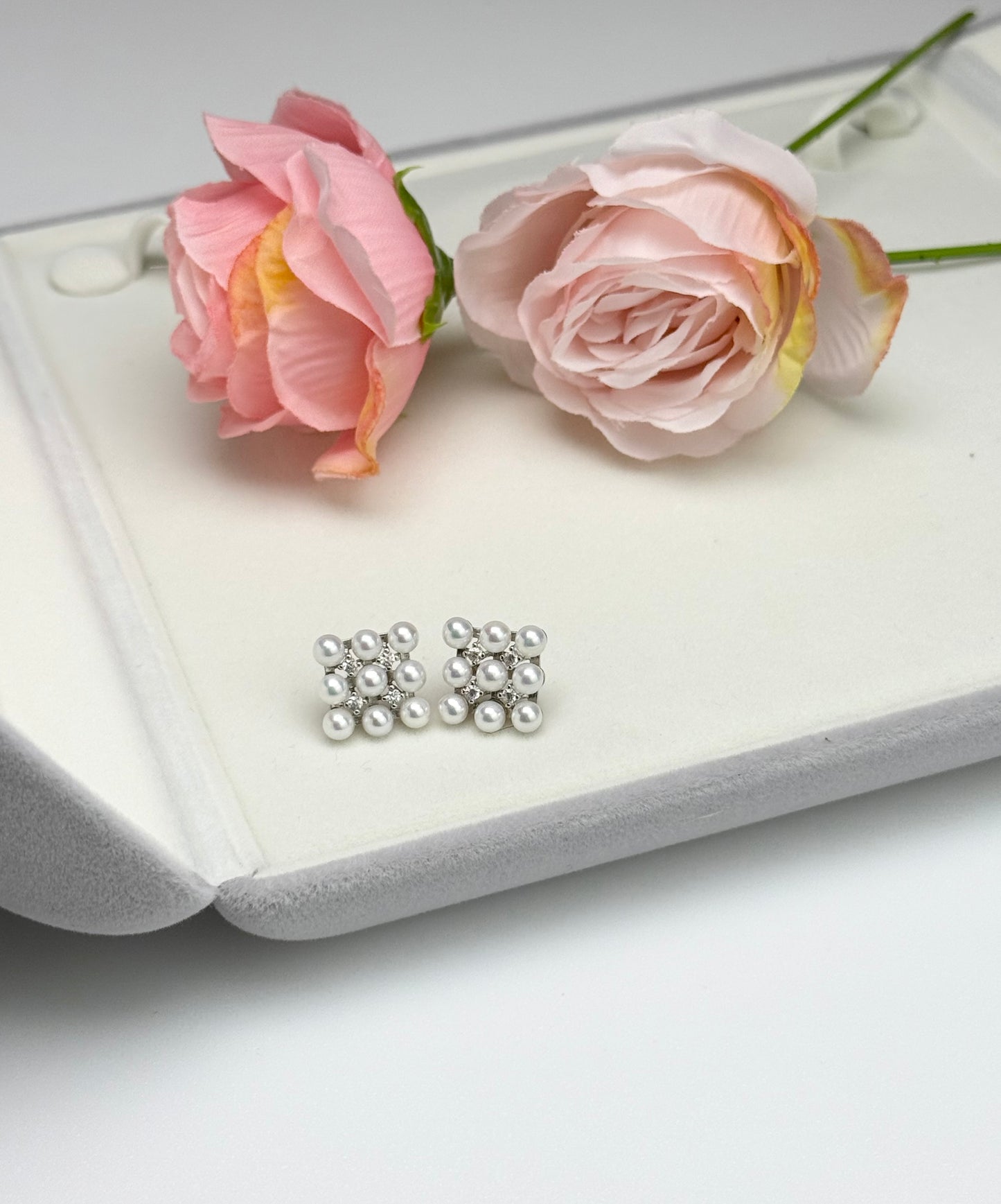 Elegant Blossom Freshwater Pearl (4-4.5mm) Stud Earrings.