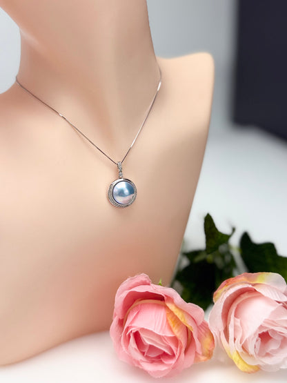 Silvery-Blue Saltwater Mabe Pearl Pendant with Iridescent Overtones