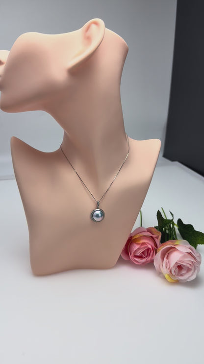Silvery-Blue Saltwater Mabe Pearl Pendant with Iridescent Overtones